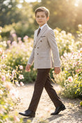 Load image into Gallery viewer, Boys Beige Double-Breasted Blazer with Brown Trousers 2-Piece Suit
