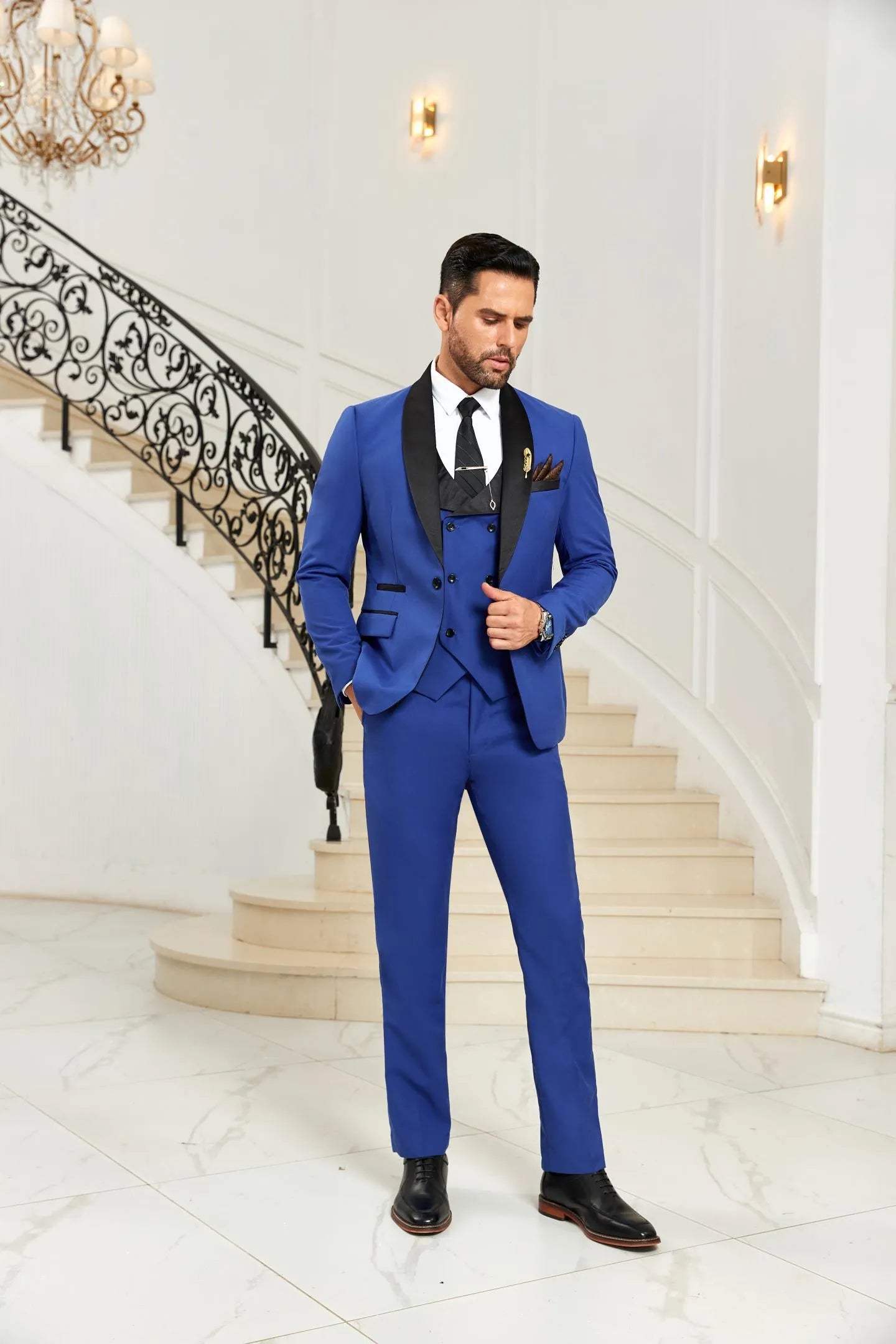 Royal blue shawl collar 3 piece men's suit angled standing pose showcasing tailored fit – blazer, vest, trousers set